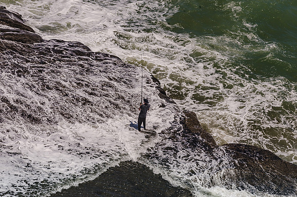 FISHING IN RAIN AND SHINE